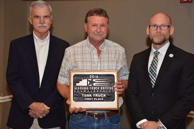 FedEx Freight's Kenneth Lockhart, center, won first place in the Tank Truck class. (Image Courtesy of Alabama Trucking Association/Facebook)