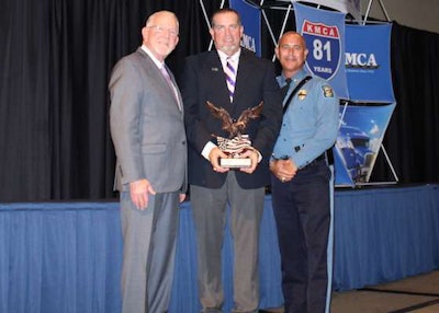 FedEx Freight’s Donald Logan, center, is Kansas’ grand champion. (Image Courtesy of Kansas Motor Carriers Association)