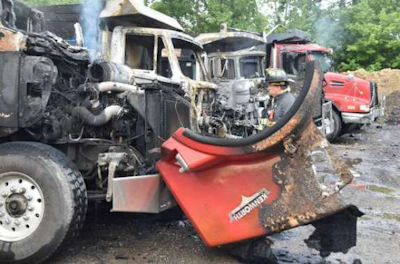 Trucks were destroyed in a fire in Indiana on the Fourth of July. (Indianapolis Fire Department photo)