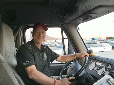David Allred, C.R. England's director of management services, behind the wheel during a run. (Image Courtesy of C.R. England)