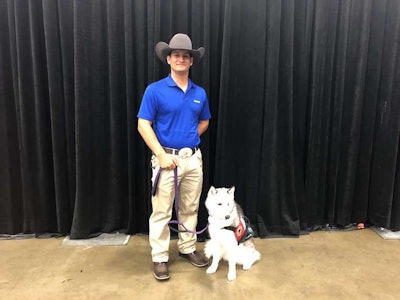 Quinton Ward, accompanied by his service dog Kirra, was announced as one of four finalists for the Transition Trucking award during GATS.