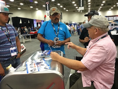 Terry Kirkpatrick (right) talked to visitors to the Alumitank booth at GATS.