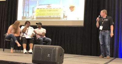 As Andrew Hadland, president of CRST’s asset light companies, presents Chanita Ward with her custom truck, she is overcome with emotion.