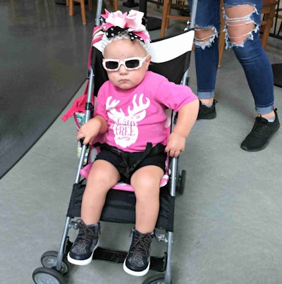 One young GATS attendee figured out how to see the show and not do a lot of walking.