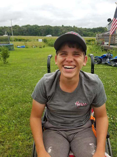 Dakota has received shirts and hats from several companies, including Korth Trucking. (Image Courtesy of Peggy Cadd)