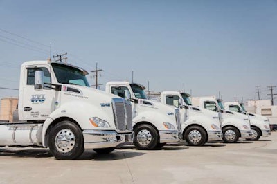 Some of Food Express’s new natural-gas-powered trucks