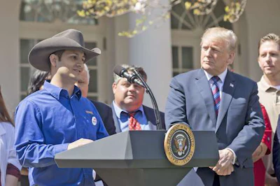 Ward, far left, spoke on behalf of Werner at a White House event earlier this year.
