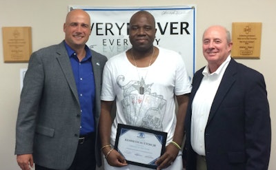 Ascent Global Logistics driver of the year Kenneth Sutton Jr. (center) from the Atlanta area.