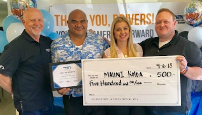 From left to right: Ben Kirkland, Mauni Koloa (Driver of the Year), Xochi Becerra (Terminal Manager), Ken Motzenbecker (VP Western Division). Mauni Koloa is from the Los Angeles area.
