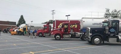 Trucks were lined up on display at the D.R.I.V.E. program’s fundraiser launch. (Image Courtesy of Northeastern High School/Chad Forry)