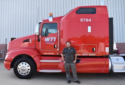 WTI Transport gave away this 2014 Kenworth T660 to driver Liberato Lupo.