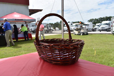 Over 200 drivers' names were placed in a basket and a winner was randomly selected via a drawing. The winner won a 2014 Kenworth T660.