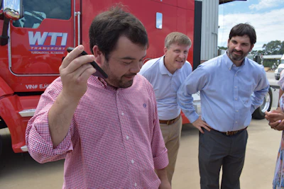 WTI Transport Vice President of Operations Josh King calls driver Liberato Lupo to let him know he won the drawing for a 2014 Kenworth T660.