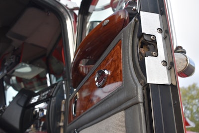 The interior door handles are Rockwood in the African rosewood variety. They have built-in finger grips.
