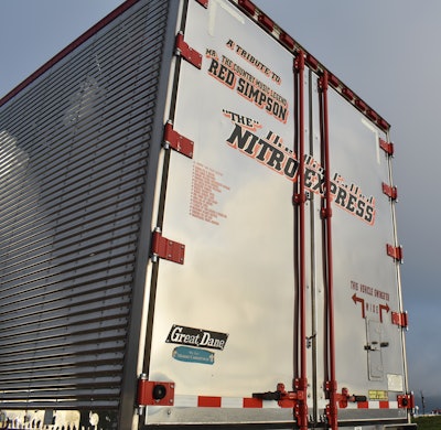 The back of the truck declares it to be 'A Tribute To The Country Music Legend Red Simpson.'