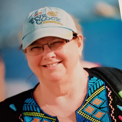 Anne Goodnough, picture here during a cruise, is an avid traveler. (Image Courtesy of Anne Goodnough)