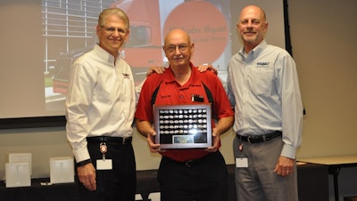 Left to right: Senior Vice President of HR, Quality, and Fleet Services Richard Bogan, driver Malcolm Bryant, and President Tobin Cassels (Image Courtesy of Southeastern Freight Lines)