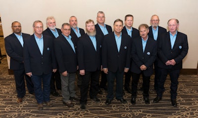 Pictured (front row, left to right): Randy McKee, Butch Grigsby, David Evans Jr., David Swan, Larry Goetz and Glen McCartney. Back row, left to right: Earl Taylor, Gary McMichael, Brian Ellison, Dave Wojciechowski, Brett Coward and Harold Chapman. (Penske Logistics photo)