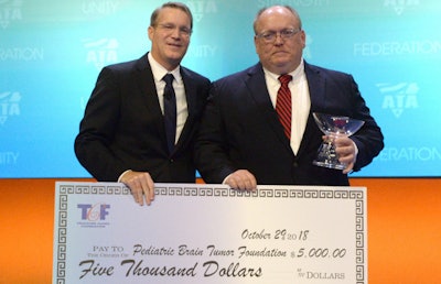 Herschel Evans (right) accepts his award from ATA President and CEO Chris Spear (ATA photo)