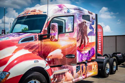 This truck is P&S Transportation's second veteran memorial truck. It is driver by a Marine Corps veteran named James Hughes. (Image Courtesy of Facebook/P&S Transportation)
