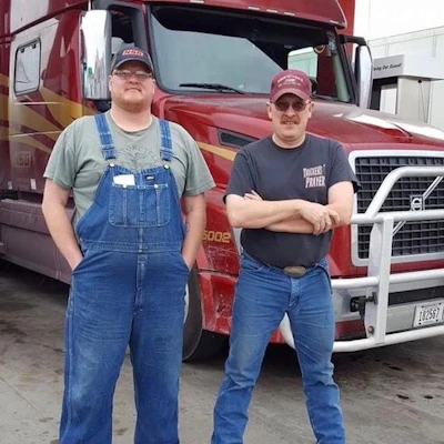Steve Schildhauer, left, was nominated by his brother Dan, right, to drive this year’s WAA Honor Truck. (Image Courtesy of Wreaths Across America)