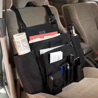 The Cab Commander from Duluth Trading keeps everything your trucker may need organized and easily accessible. It has padded pockets and compartments for their laptop, rolled up atlas, cell phone, headset, and more. It unbuckles so that it can easily be carried in and out of the cab. The Cab Commander retails for $40.