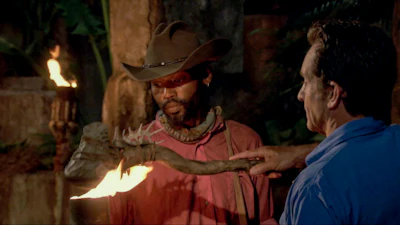 “Tribal Lines Are Blurred” – Jeff Probst extinguishes Carl Boudreaux’s torch at Tribal Council on the eleventh episode of SURVIVOR: David vs. Goliath on the CBS Television Network. (Photo: Screen Grab/CBS Entertainment©2018 CBS Broadcasting, Inc. All Rights Reserved.)