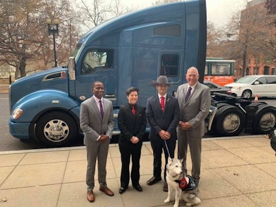 The four finalists for the 2018 Transition Trucking award stand in front of the 2018 Kenworth T680 that was awarded to the first place winner, Quinton Ward. From left to right: Chris Young, Summar Hanks, Quinton Ward, and Mordaunt “Platt” Brabner. (Image Courtesy of Fasport)