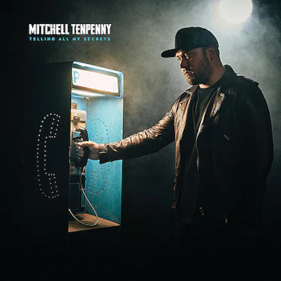 Mitchell Tenpenny on the cover of his debut album, Telling All My Secrets.