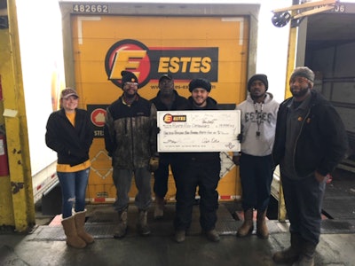 Estes employees with donation bound for orphans in Puerto Rico (Estes photo)