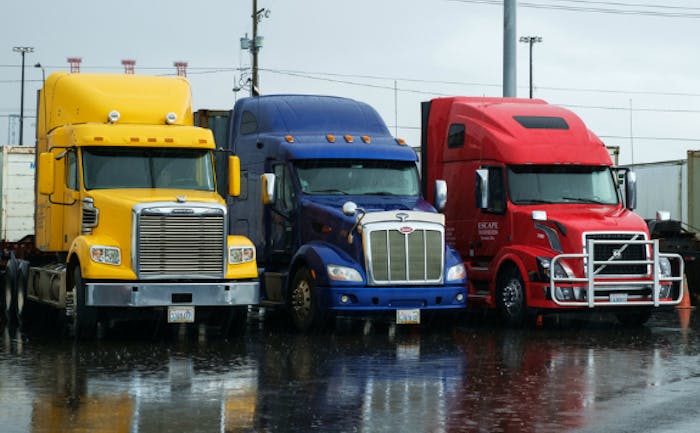trucks-idle-in-rain