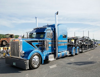 The 2015 Peterbilt 389; 2018 Wally-Mo 8 Car Hauler of Eric Turner Sr. captured Best of Show at Shell Rotella SuperRigs in 2018.
