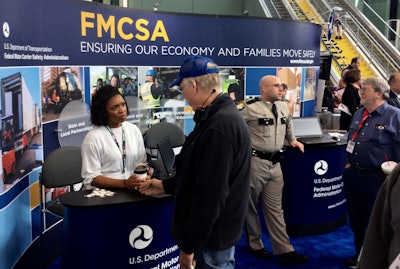 The Federal Motor Carrier Safety Administration booth welcomed a steady stream of people with questions.
