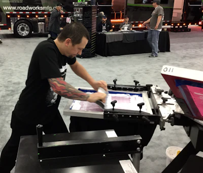 Zach Stone silkscreens T-shirts at MATS