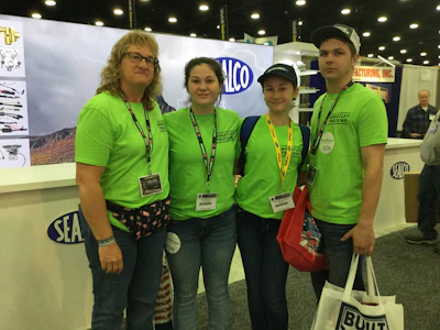 Tammy Reeser, Tessa Wheatly, Cheyenne Wheatly and Eddie Knight represent Wheatly Trucking, a grain hauler from Bloomington, Indiana at MATS Saturday morning.