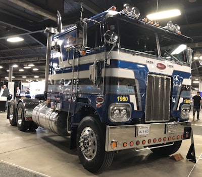 The paint on Sherman Kerns' Peterbilt COE is original with the exception of the paint on the front, which had to be repaired due to damage that occurred before Kerns received it.