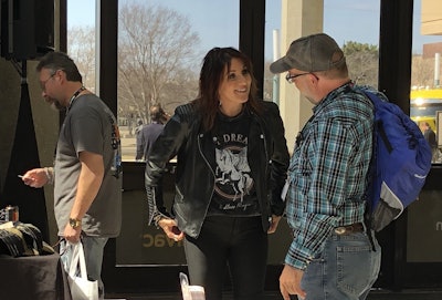 Country artist Jayne Denham speaks with MATS attendees during an appearance at the Red Eye Radio booth.