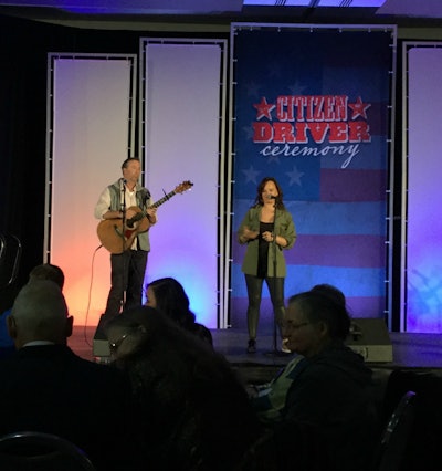 Lindsay Lawler and Chris Roberts perform ‘I Drive’ at the Citizen Driver luncheon.
