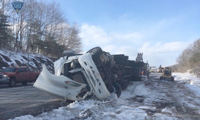 Truck rollover on Interstate 495 spilled whiskey bottles. (Mass State Police photo)