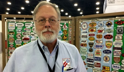 Dale Bridge and his display of patches at MATS