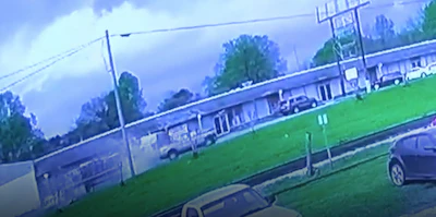 Surveillance camera footage from a nearby business shows the 18-wheeler striking a pickup before hitting other cars and a daycare center in Alabama.
