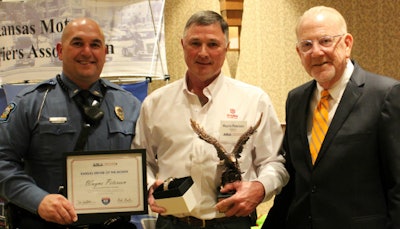 Lieutenant Tom Catania (left), with driver of the year winner Wayne Peterson (center), KMCA Executive Director Tom Whitaker (right) Photo by KMCA
