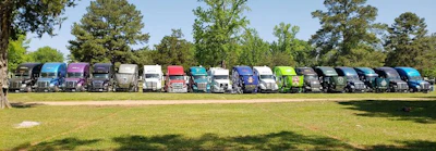 Members of the Annual Talladega Drivers Group park together at the Talladega Superspeedway. (Image Courtesy of Tom Altom)