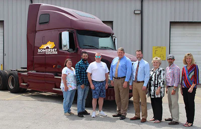 Executives from CoreTrans presented Somerset Community College representatives with a 2007 Volvo sleeper truck on April 30 at the fleet’s headquarters. (Image Courtesy of Somerset Community College)