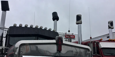 The Make-A-Wish convoy is held rain or shine and some drivers came prepared for Sunday's steady downpour.