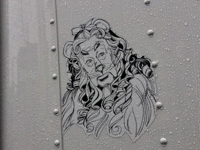 Cowardly Lion on the side of 'Dorothy'