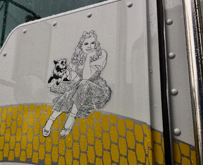 Dorothy and Toto on the Yellow Brick Road
