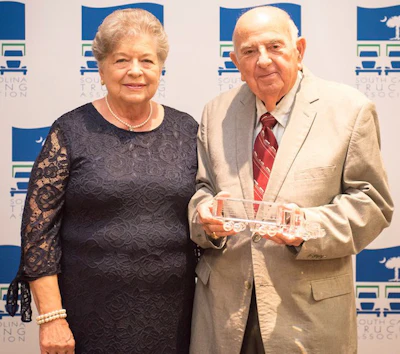 Doug Lax, right, accompanied by his wife Helen Law, left, received the Service Award. (Image Courtesy of South Carolina Trucking Association/David M. Wes)