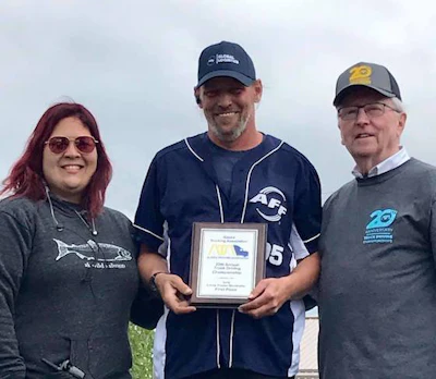 American Fast Freight driver Denny Hawkins, center, won first place in Alaska's 3-axle class. (Image Courtesy of Alaska Trucking Association/Facebook)