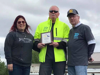 UF&T driver Michael Frye, center, won first place in Alaska's 5-axle class. (Image Courtesy of Alaska Trucking Association/Facebook)